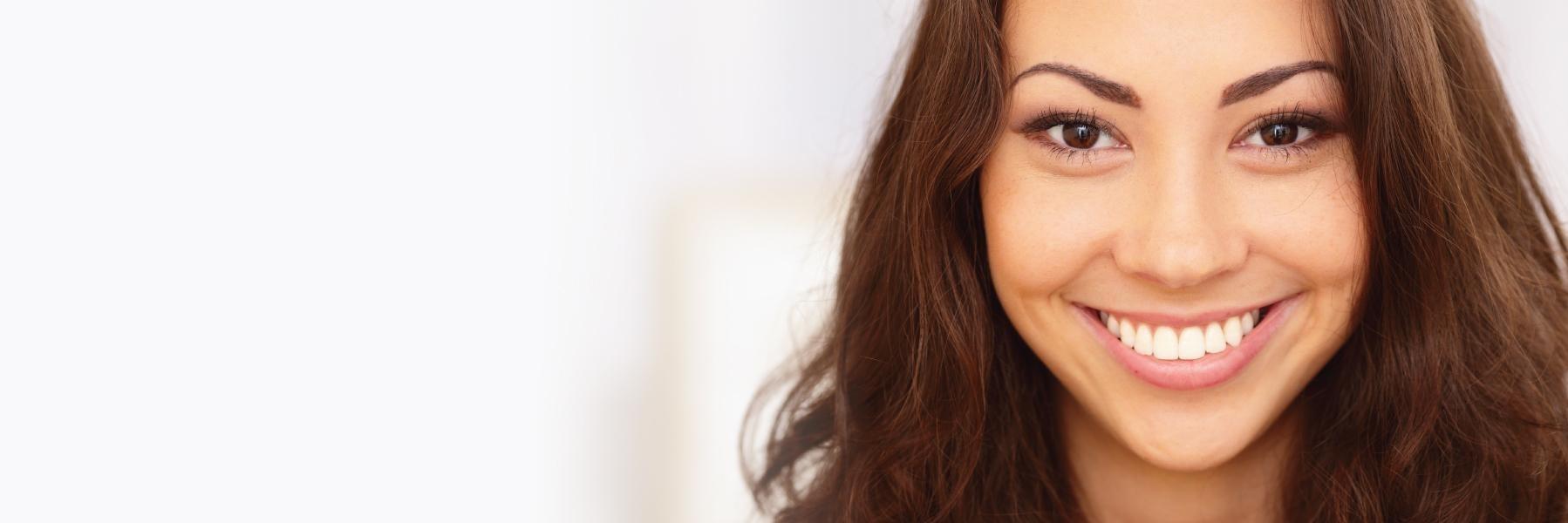 Young woman with bright smile l Six Month Smiles Summerville SC